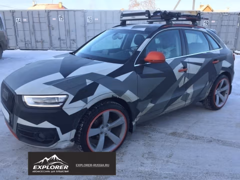 Фото установки крепления Thule XTENDER 739 для перевозки 6-и пар лыж на Audi Q3